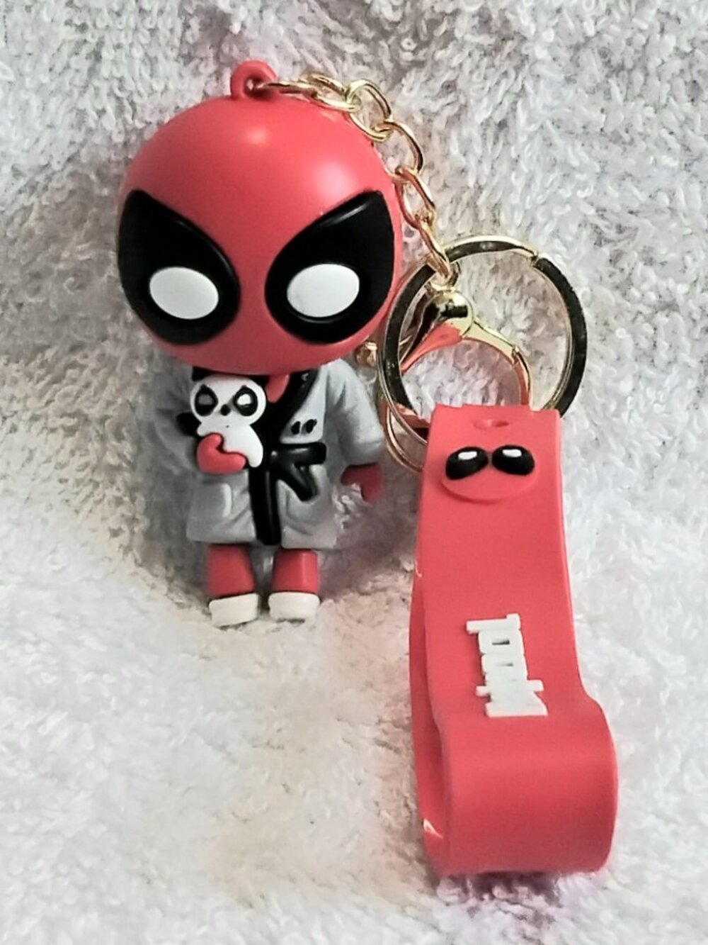This 2/$20 3D Silicone Deadpool Keychain made of Very Durable Rubber wil
